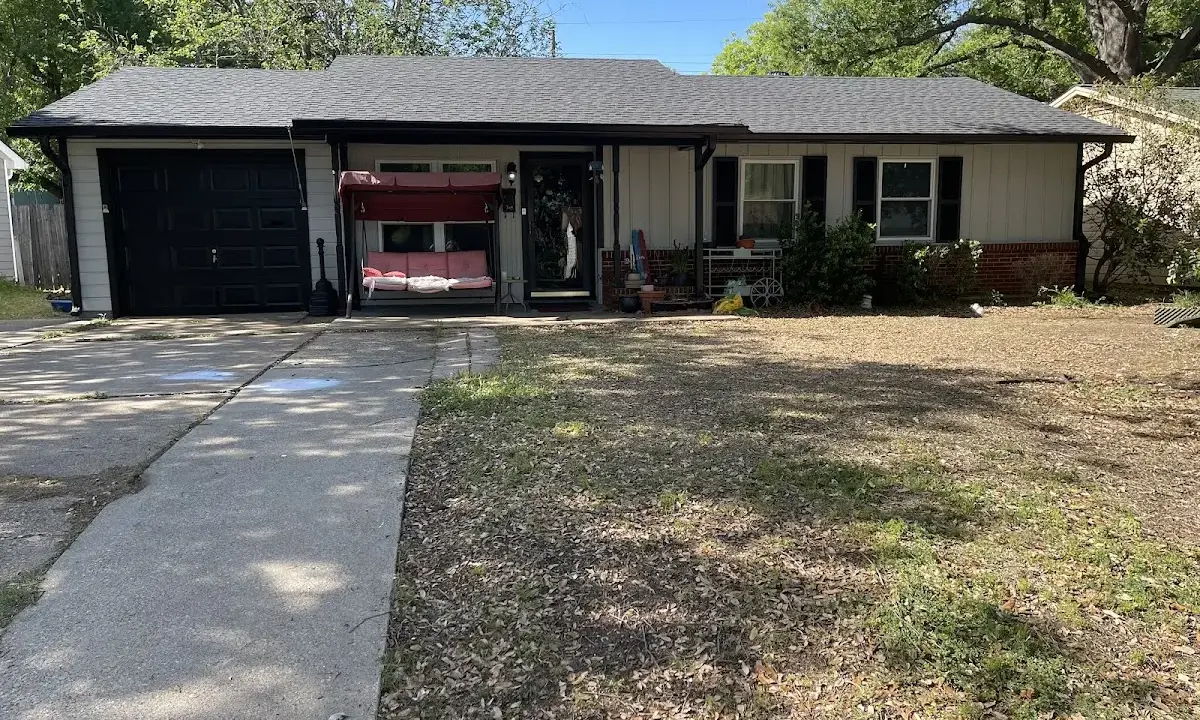 Asphalt Shingle Roof Repair crew at work on a residential roof in Socastee